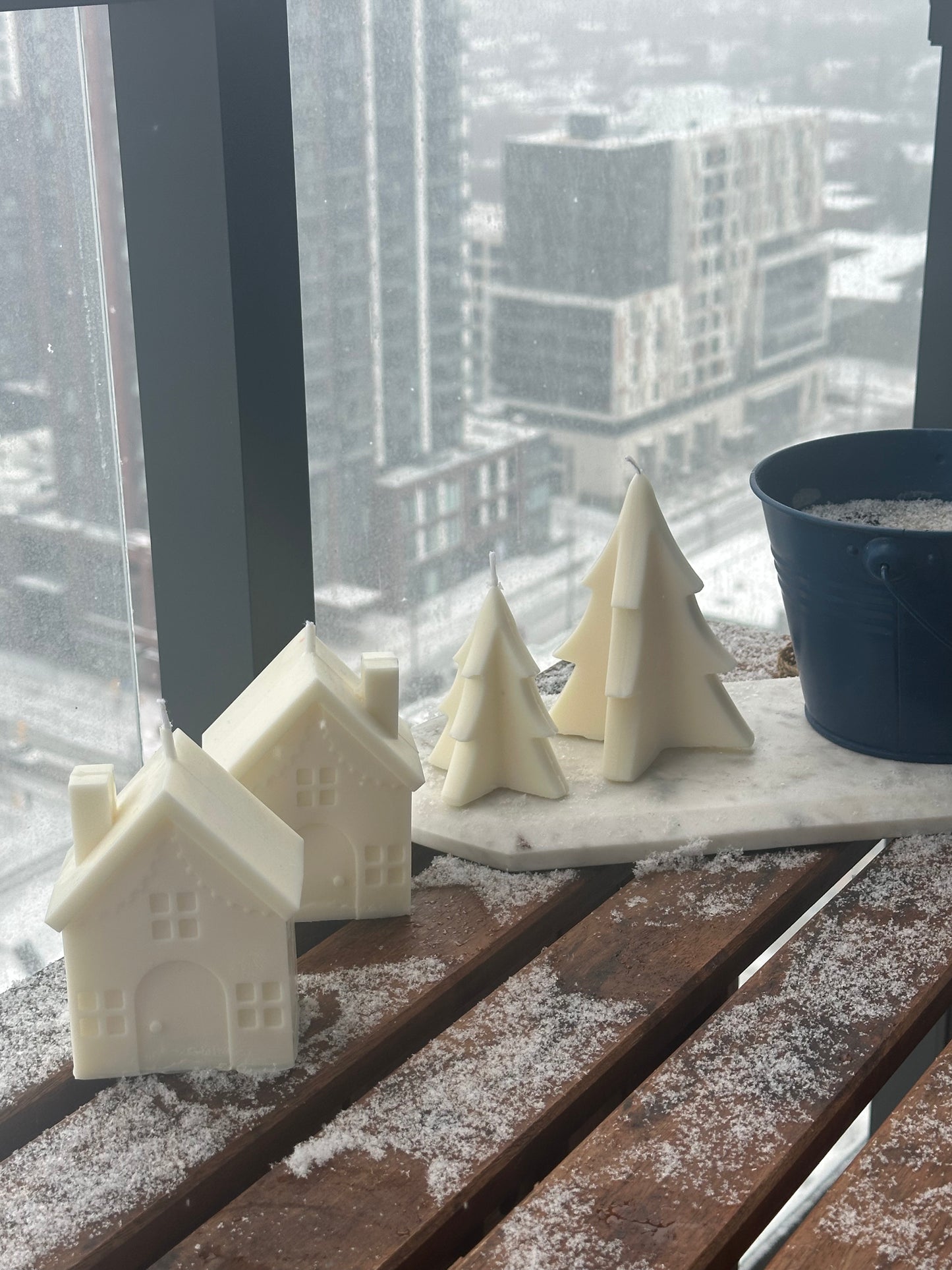 Holiday-themed Christmas tree candle for winter decor.