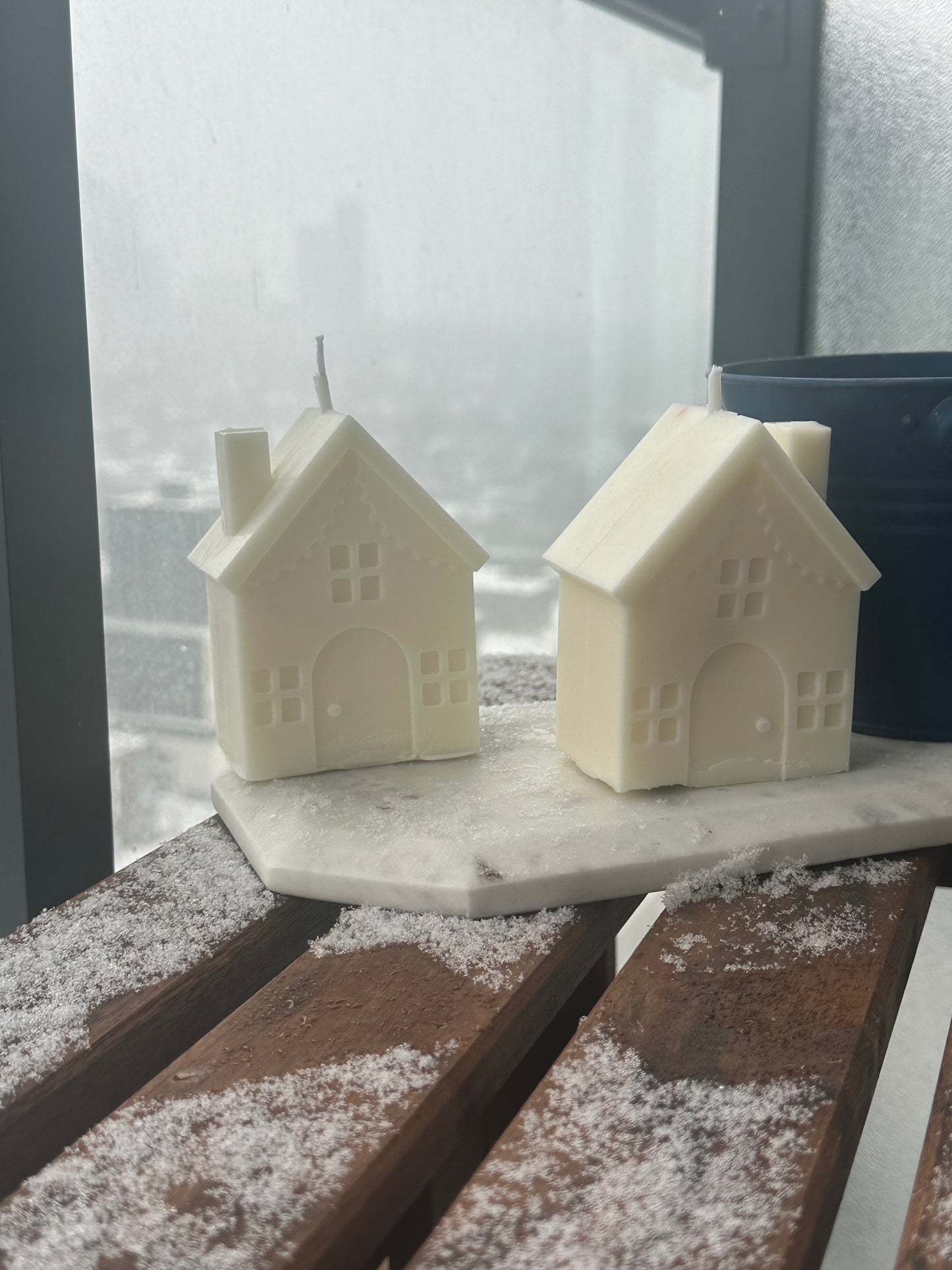 Decorative house candle, ideal for creating a cozy Christmas atmosphere